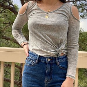 Long sleeve shirt with cut out shoulder